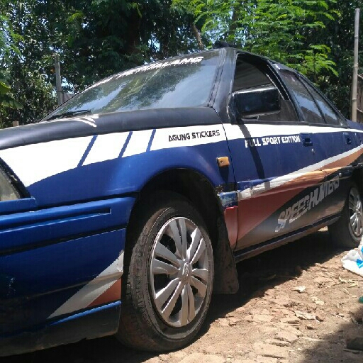 mobil sedan proton 5