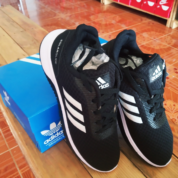 Adidas Solar Hitam List Putih