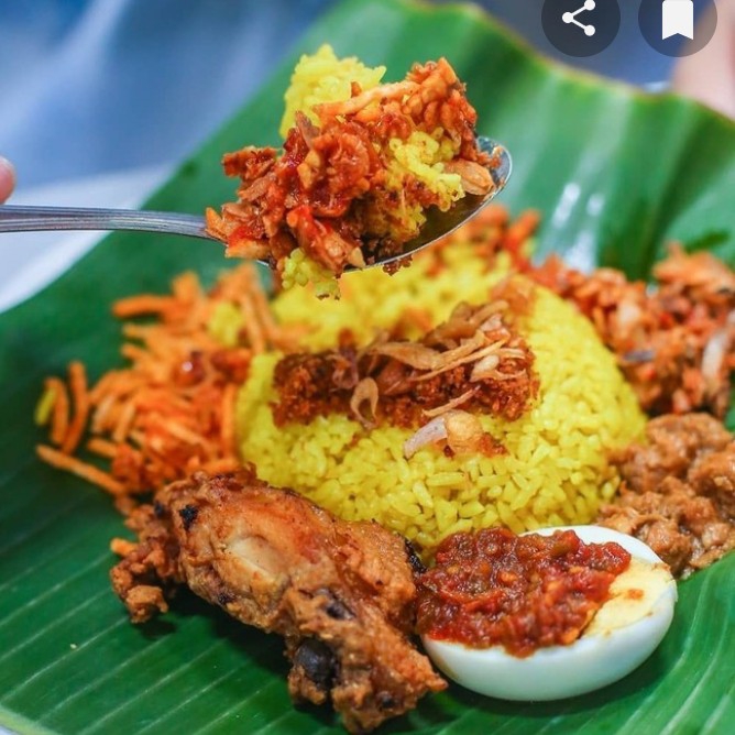 Nasi Kuning Haruan Telur