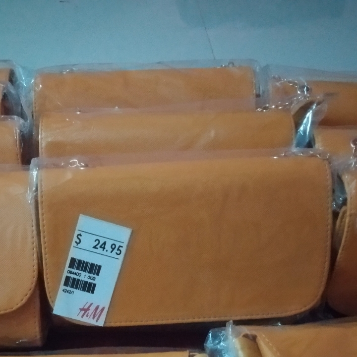 Tas Selempang Turun Harga