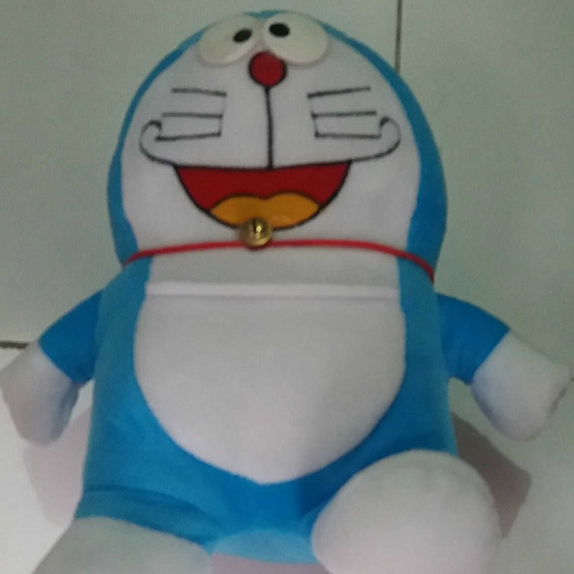 boneka doraemon ukuran sedang