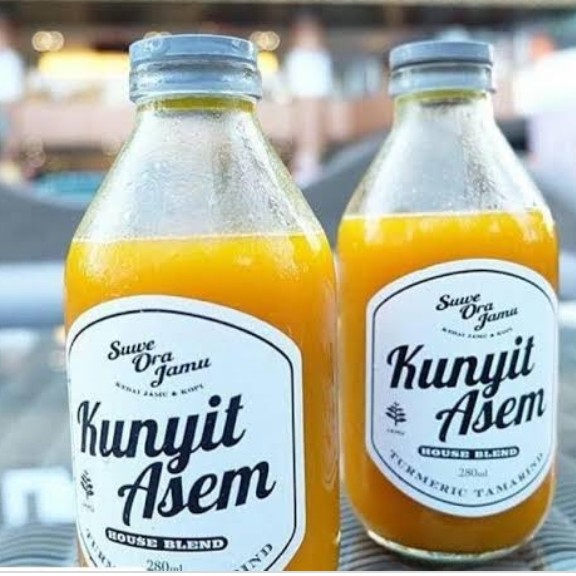 satu gelas minuman khas kalijo KUNYIT ASAM